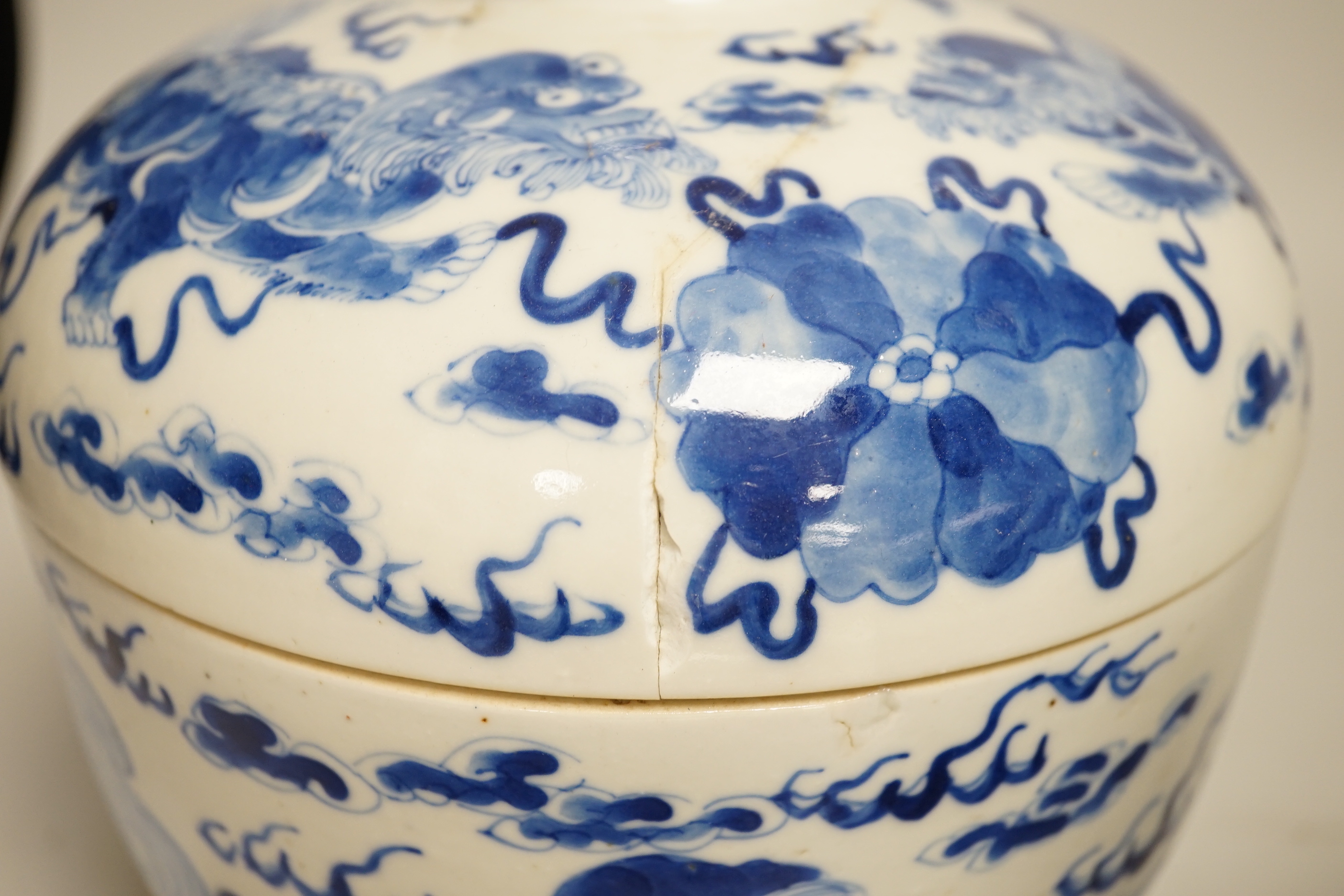 A pair of Chinese blue and white 'Buddhist lion' bowls and covers, chupu, probably made for the Straits market, late 19th century, 20cm high